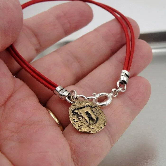 Hadar Designers Yng Leather bracelet brass charm, Ancient Hebrew script Chai (as