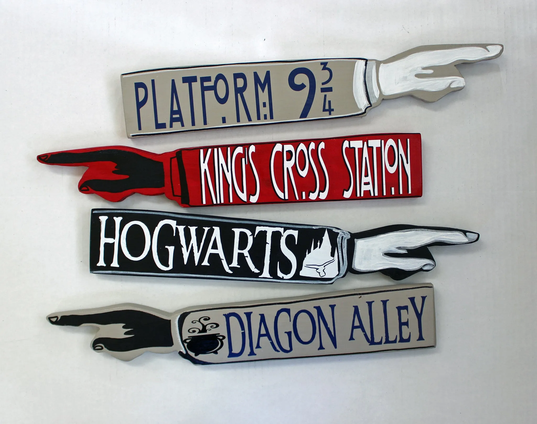Potter Collection - wooden pointy finger signs